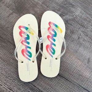 NWT sold Navy flip flops. Size 9